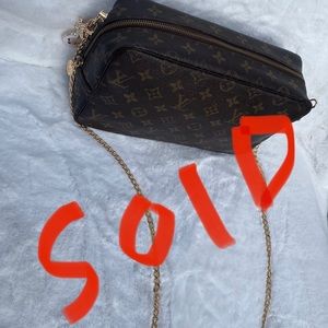 LOUIS VUITTON Monogram Trousse Toilette 28 crossbody